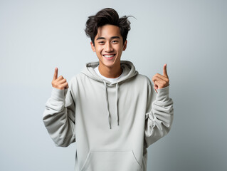 A joyful teanage in casual clothes against an isolated background