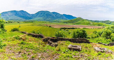 Obraz premium A panorama view of the countryside behind to the Monastery of Saint Nicholas in Mesopotam, Albania in the morning in summertime