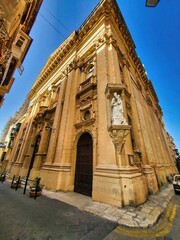 Brick wall old house. La vieille charite, almshouse, ancient building with column. The ruins of the ancient city. Religious background. Travel concept. Tourist attraction. Close up. Arkadi aspect