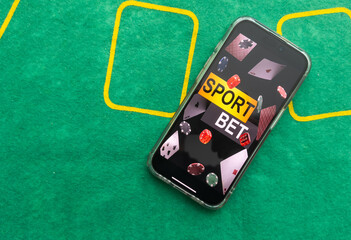 Gambling online casino Internet betting concept green screen. smartphone with poker chips, dice....