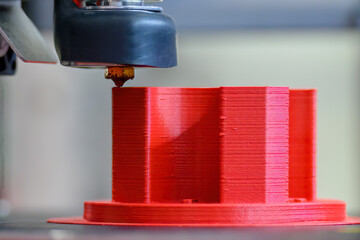 Close up scene the additive manufacturing by 3D printer machine.