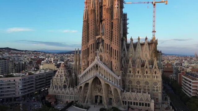 Barcelona Eixample residential district and famous Basilica Sagrada Familia at sunset. Catalonia