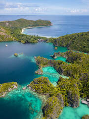 Raja Ampat, Indonesia: Aerial view of the Piaynemo viewpoint famous for its limestone karst...