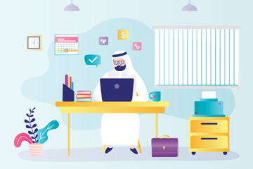 Arabian businessman sits at workplace. Smart entrepreneur works. Muslim manager sitting at desk and working on computer.