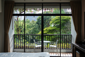 Room interior with greenery balcony view on sunny day