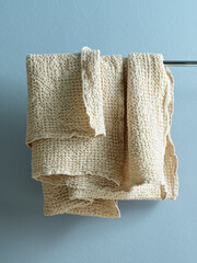 white waffle towel with shower products