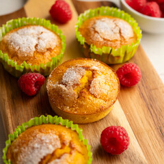 Homemade muffins with fresh raspberries in a French bakery.