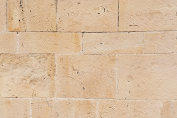 Fototapeta premium Gray and beige stone wall background