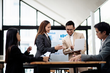 Group of teamwork businesspeople are meeting working and brainstorming about business financial and marketing on paperwork and presentation.