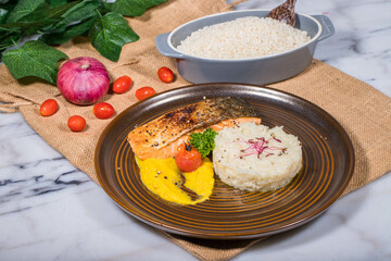 rice with meat and vegetables or fish