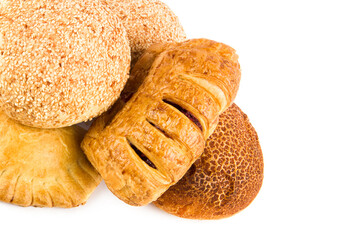 Fresh baked wheat buns isolated on white. Free space for text.