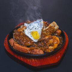 Mixed seafood contain grilled meat assortment with pepper and egg