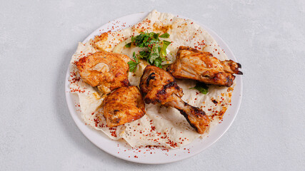 Chicken kebab on plate top view