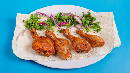 Chicken kebab on plate top view