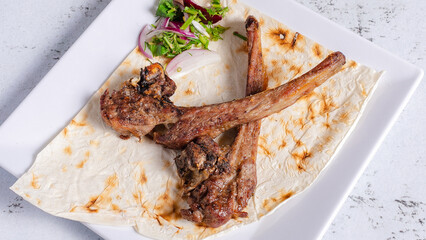 Mutton kebab on plate top view