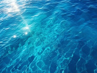 Obraz premium Aerial view of deep blue ocean water surface with subtle wave patterns, creating a stunning and dynamic visual effect