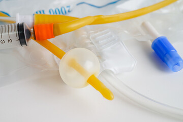 Foley urinary catheter with urine bag for disability or patient in hospital.