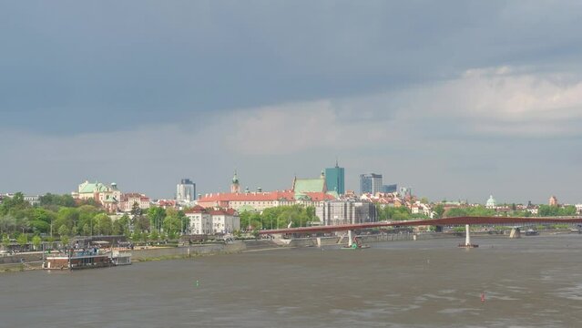 Warsaw Poland time lapse city skyline at Praga Footbridge and old town