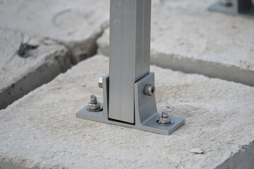 Solar cell panel mounting bracket on concrete blocks