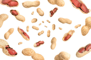 Unpeeled peanuts in air on white background
