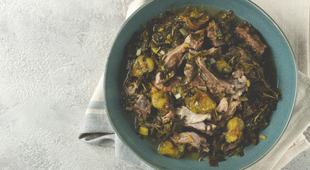 chakapuli, Georgian dish, stewed meat with herbs and tkemali, in white wine, homemade, no people,