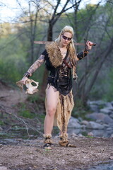 Viking warrior with sword, skull and battle bat