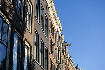 Low angle view of building against clear blue sky