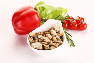 Marinated mussels in the bowl