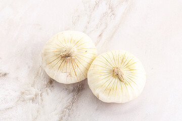 Raw white onion heap isolated
