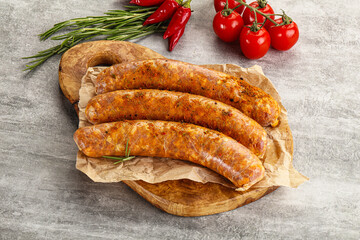 Raw sausages with spices and herbs