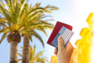 European health insurance card held on a holiday background. Concept, Travel insurance, Vacation...
