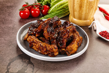 Grilled pork ribs in barbecue sauce