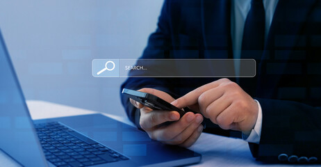 Businessman clicking internet search page on touch screen.  Searching information on internet. SEO searching. 