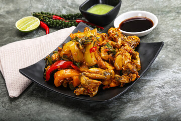 Vietnamese cuisine - fried frog with vegetables