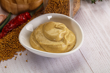 Dijon mustard sauce in the bowl