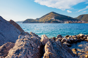 Picturesque view of the blue sea and rocky coast in the Budva Riviera. Montenegro, Balkans, Europe.