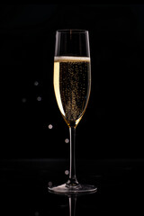 One glass of champagne on a black background