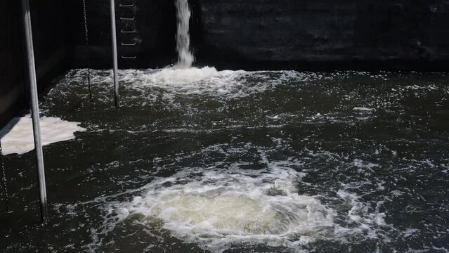 Flowing wastewater tank, wastewater treatment plant. Tanks for aeration and biological purification of sewage.