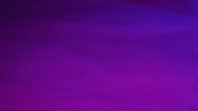 Fantasy sky. Neon mist. Defocused fluorescent purple blue color gradient steam texture paint water flow motion abstract art background with free space.