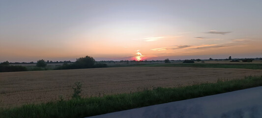 Sunset over the field between Lukino Selo and Muzlya