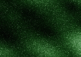 Green glitter light shining background. Starry night sky. Galaxy space. Glowing stars in the night. New Year, Christmas and Celebration concept. 