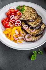 grilled vegetable eggplant, pepper, tomato fresh cooking meal food snack on the table copy space food background rustic top view