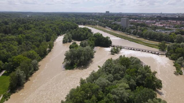 Aerial of flood in Munich Bavaria, Flaucher Steg, 4d drone, Bridge over Isar, torrent, overflow, flooding