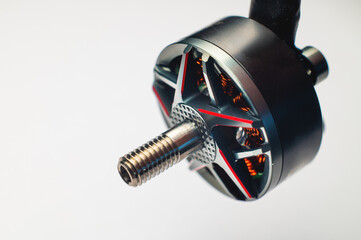 Close-up Small brushless electric motor for drone. Extreme macro photography.