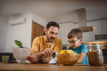 Father and son connect and install cctv security surveillance camera