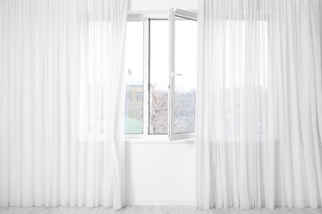 Modern open metal-plastic window with tulle