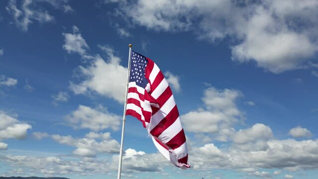 american flag and blue sky