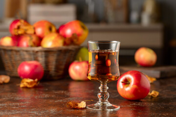 Apple juice on an old kitchen table.