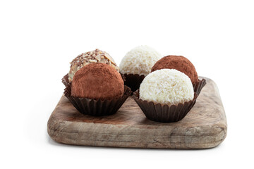 Delicious truffles with variety sprinkling isolated on white