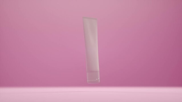 Cosmetic white package slowly rotates in air, plastic tube for bb-cream, scrub, tonic, toothpaste, body care